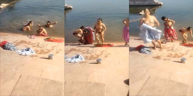 Indian village women bathing topless in pond