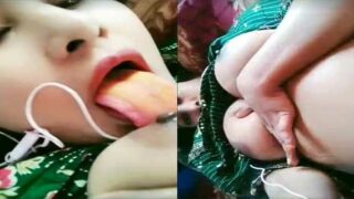 Beautiful Dehati Bhabhi sucking her own boobies
