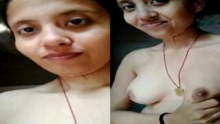 Village girl playing with her boobies on cam for lover