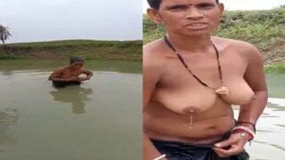 Village wife captured bathing topless in pond