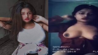 Big boobs college girl posing topless on selfie