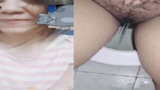 Hot village girl nude and hairy pussy pissing